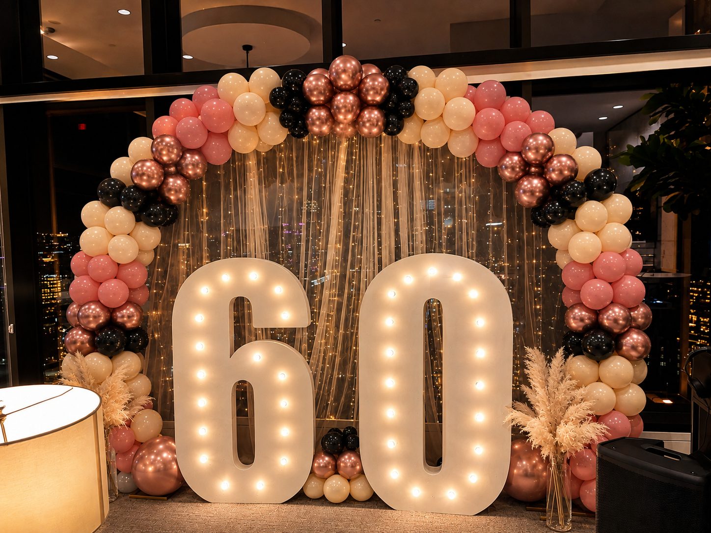 Illuminated marquee numbers with balloon garland