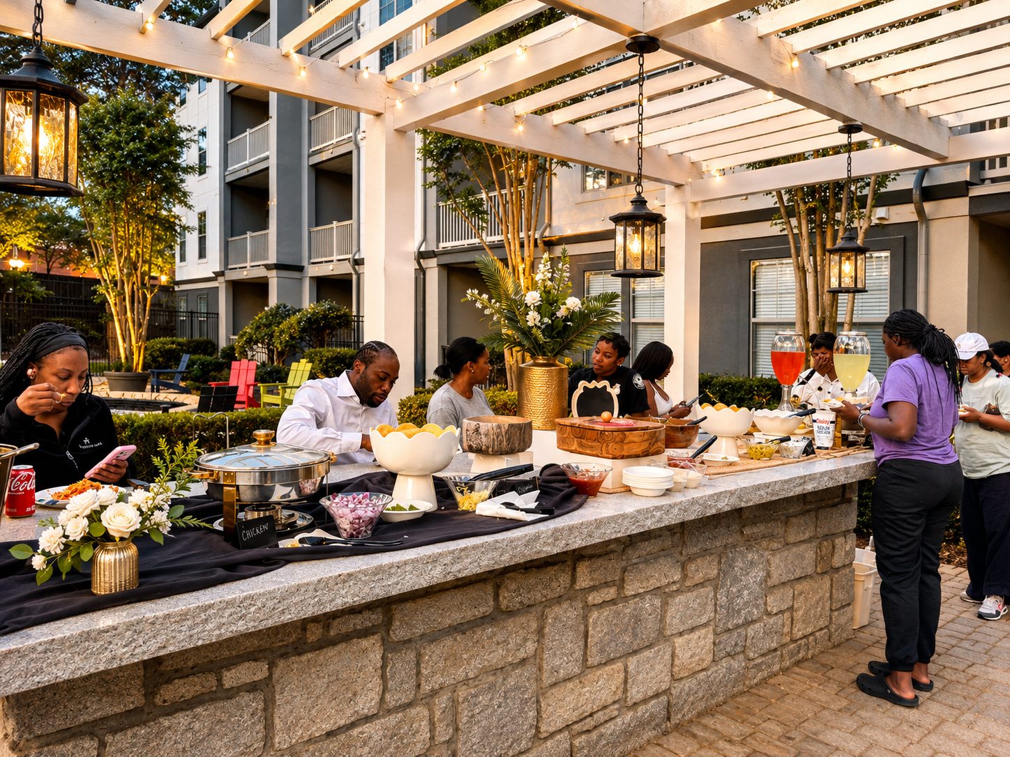 Residents gathered at a daytime courtyard event