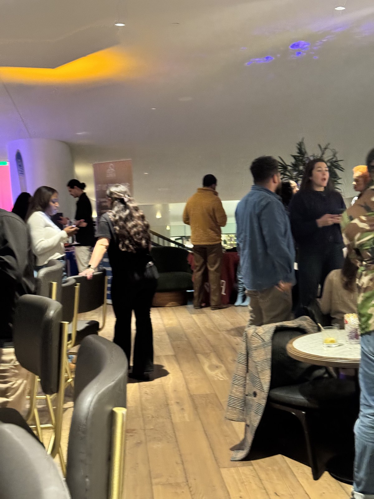 Professionals mingling at a business social