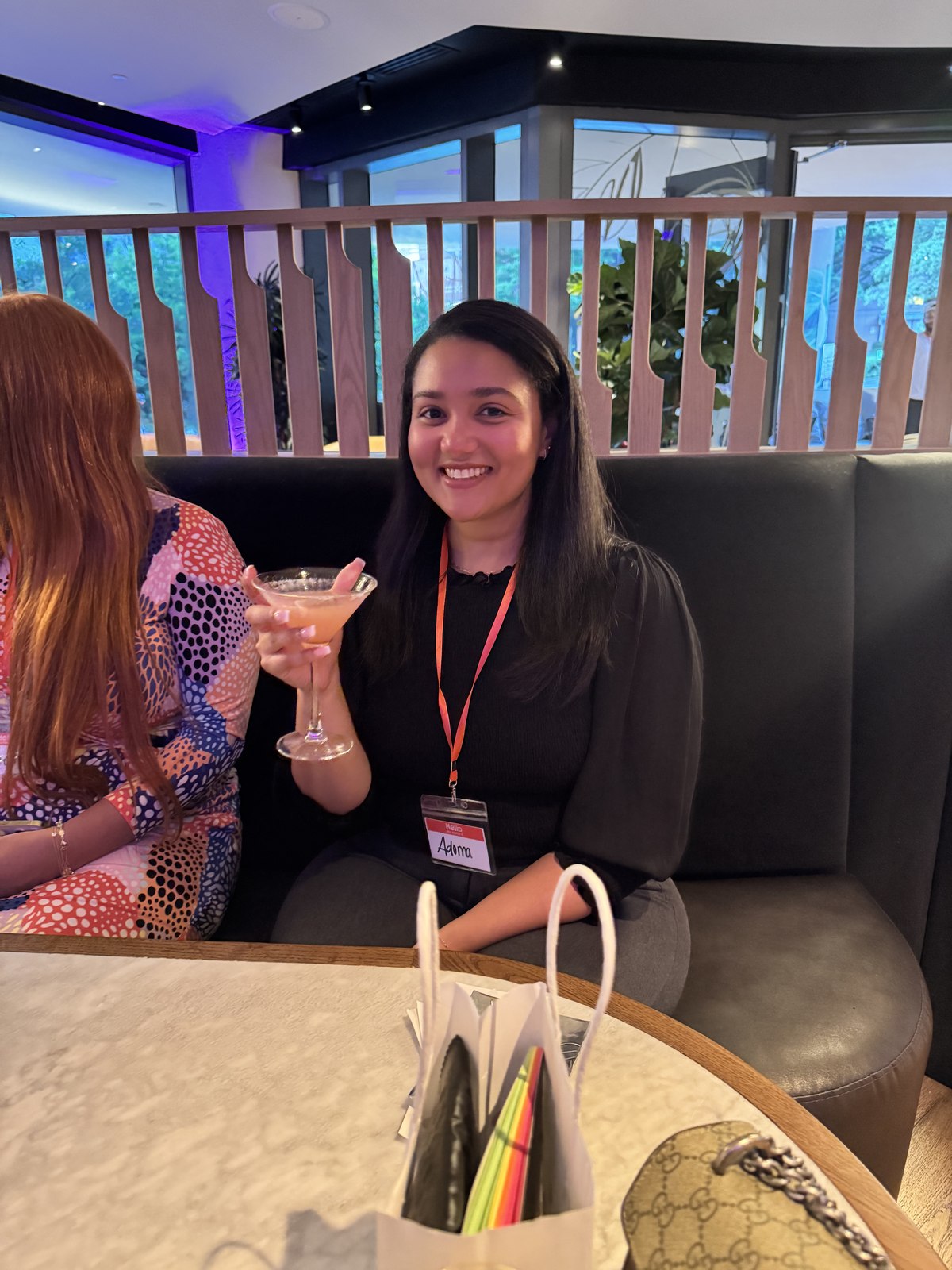 Guests connecting over drinks at a business social